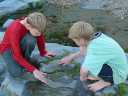 Cameron and Brendan with a fossil ammonite. Click for more pictures