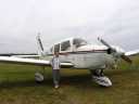 Angus with Piper Warrior VH-PBS. Click for the flight details